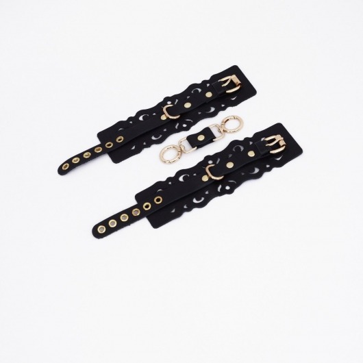 Черные кожаные наручники с узорами и золотистой фурнитурой - Crazy Handmade - купить с доставкой в Новом Уренгое